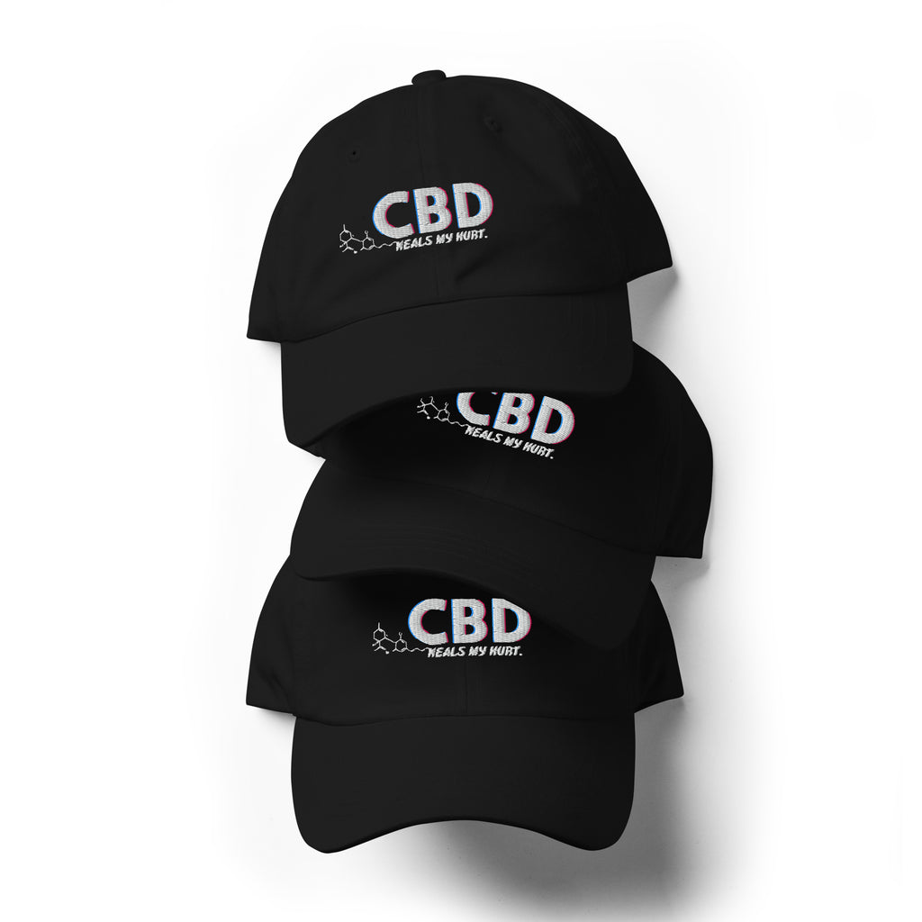 Three black CBD Heals My Hurt embroidered dad hats arranged vertically in a stacked product display.