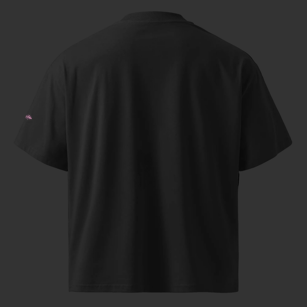 Back view of the black oversized organic tee with a plain back, high collar, dropped shoulders and wide sleeves.