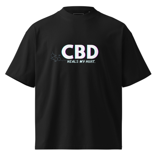 Front product view of the black CBD Heals My Hurt™ oversized organic tee featuring the statement chest graphic and CBD molecular detail.