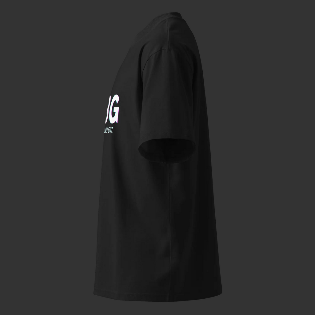 Left-side product view of the black CBG Heals My Gut™ organic tee showing its structured high neck and oversized fit.