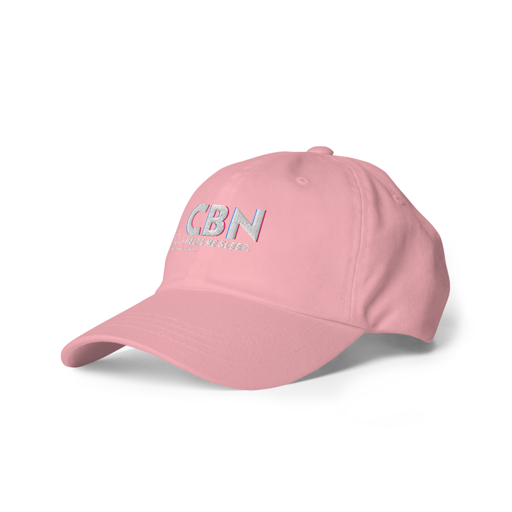 Left-front view of the soft pink dad hat featuring the embroidered CBN Helps Me Sleep artwork.
