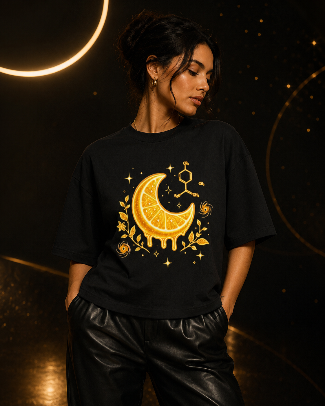 A woman wearing a black oversized T-shirt Limonene-Citrus-Moon-Black-Oversized-Tee-Womens-Lifestyle