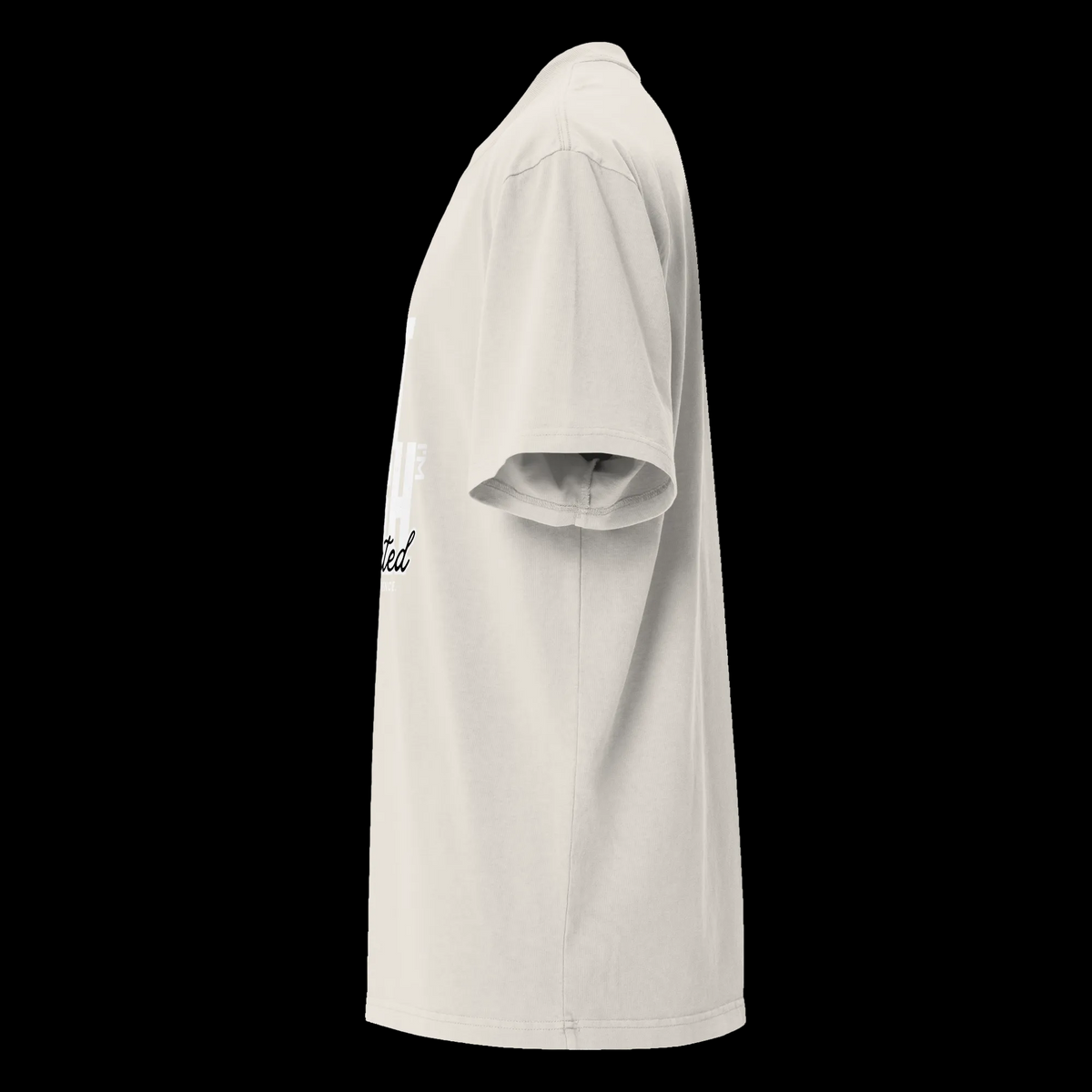 Left-side view of the faded bone oversized tee showing the drop shoulder, wide sleeve and partial front graphic.