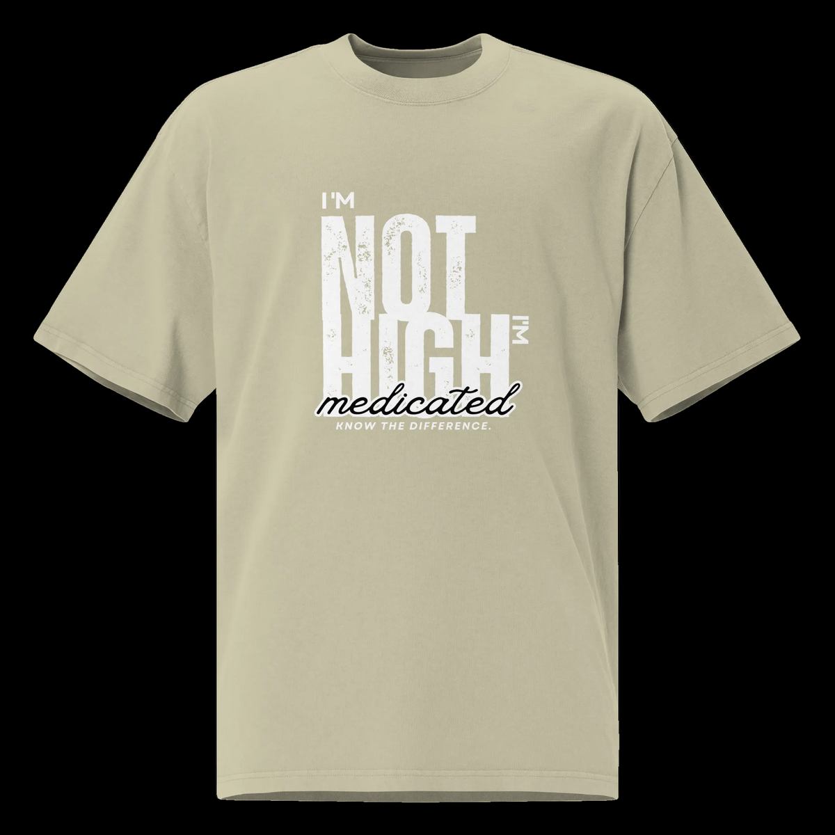 Front product view of the faded eucalyptus oversized tee with a distressed white I’m Not High, I’m Medicated statement graphic.