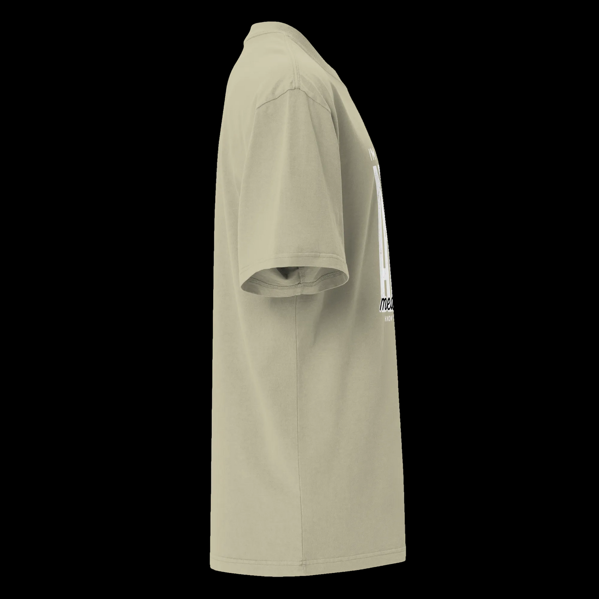 Right-side view of the faded eucalyptus oversized tee showing its relaxed fit and partial front design.