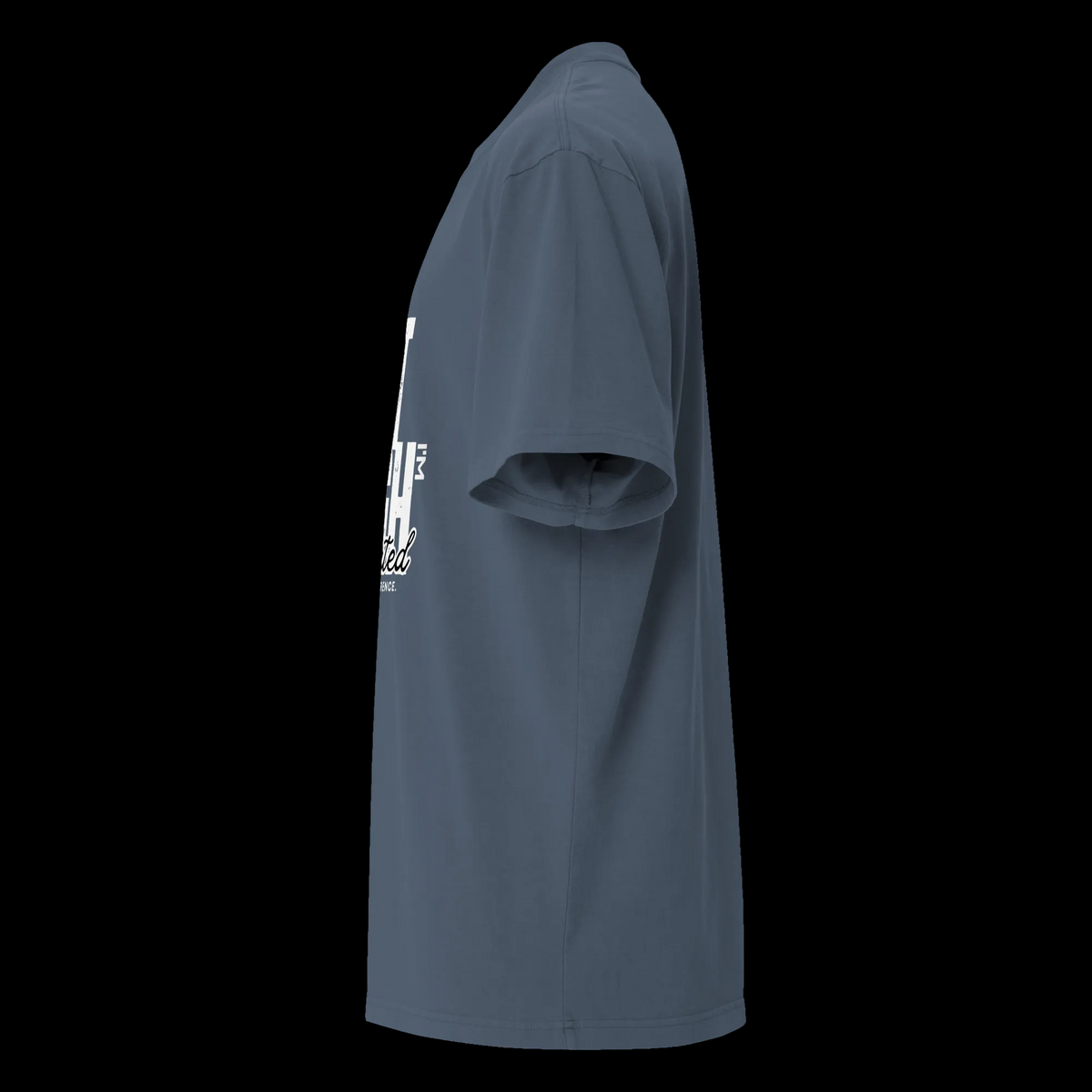 Left-side view of the faded indigo oversized tee showing the drop shoulder, wide sleeve and partial front graphic.