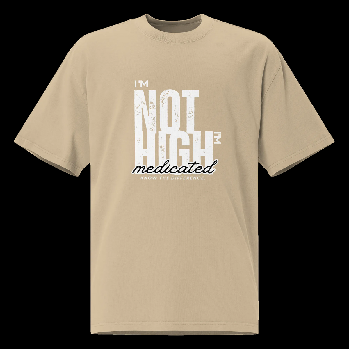 Front view of the faded khaki oversized tee with a distressed white “I’m Not High, I’m Medicated” graphic.
