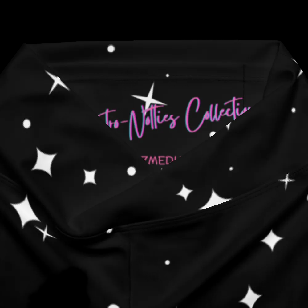 Interior waistband label reading Asstro-Notties Collection inside the black celestial flare leggings.