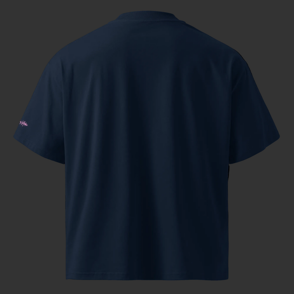 Back view of the French-navy oversized organic tee with a plain back and pink sleeve signature.