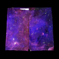 Front view of the fitted women’s yoga shorts featuring an all-over purple, blue and magenta galaxy print.