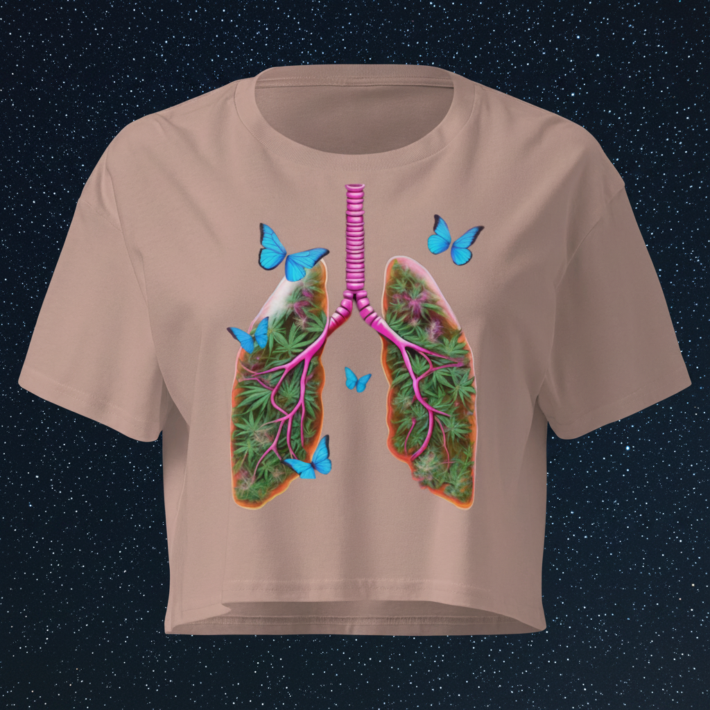 Front view of the hazy-pink women’s crop top featuring Butterfly Lungs artwork with botanical and celestial details.