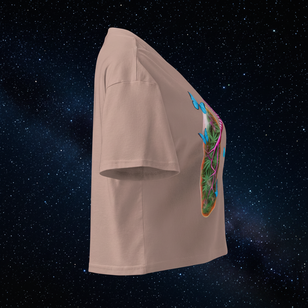 Right-side view of the hazy-pink Butterfly Lungs crop top showing its relaxed fit, cropped hem and partial front artwork