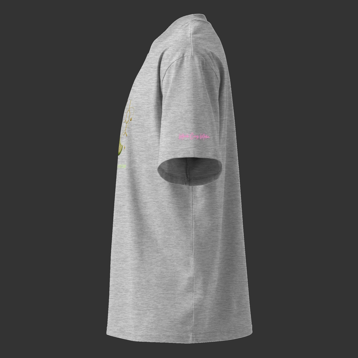 Side view of the heather-grey oversized organic tee showing its high collar, dropped shoulder and sleeve logo.