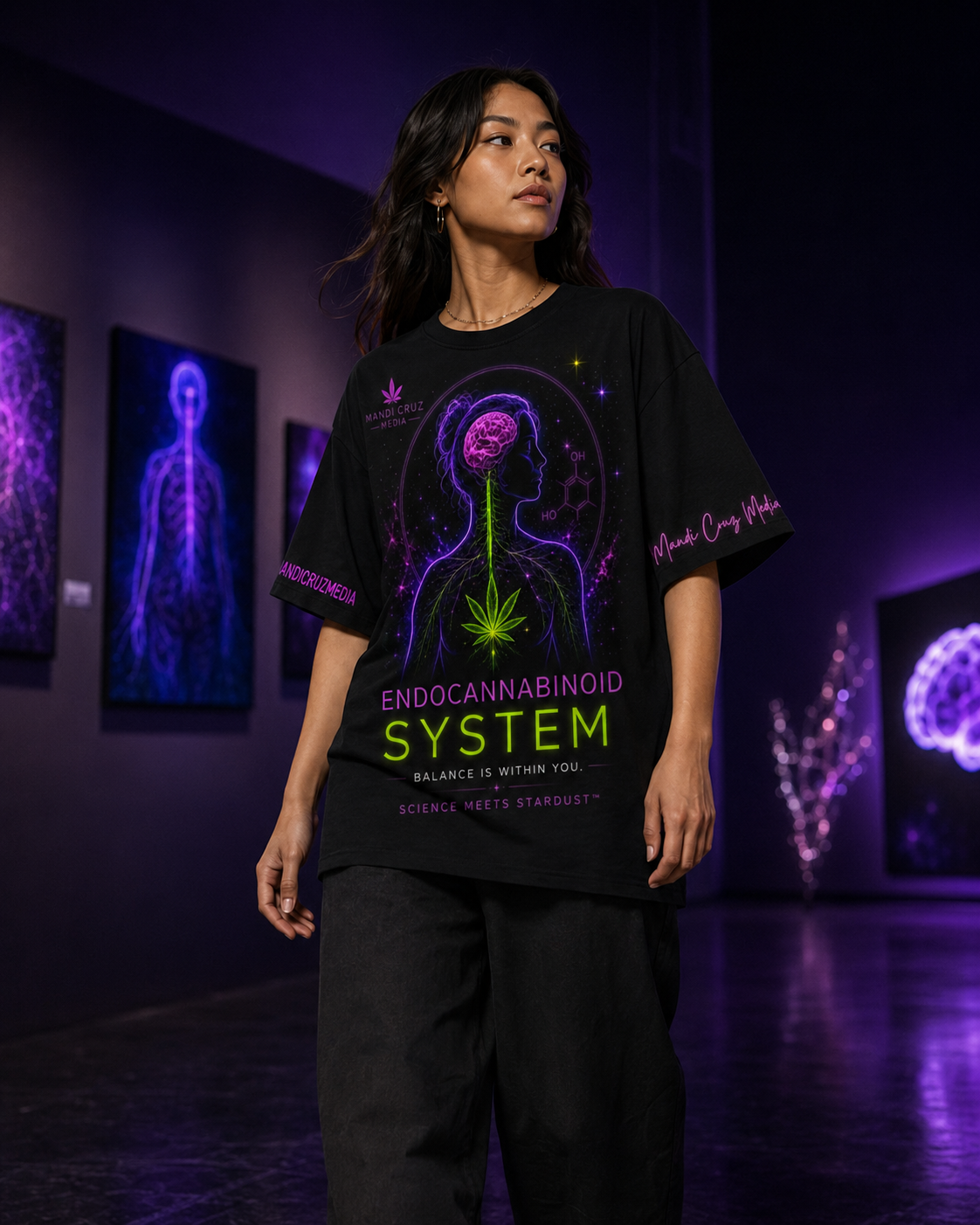 Woman wearing the black neon Endocannabinoid System oversized tee in a modern purple-lit science gallery.