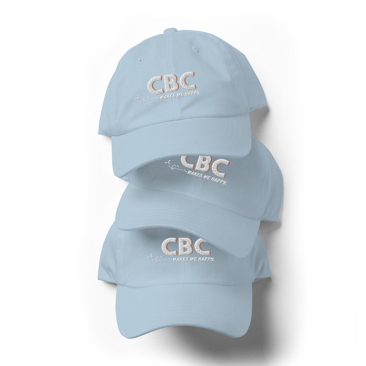 Front view of the light blue CBC Makes Me Happy dad hat featuring embroidered lettering, a curved brim and a low-profile crown.