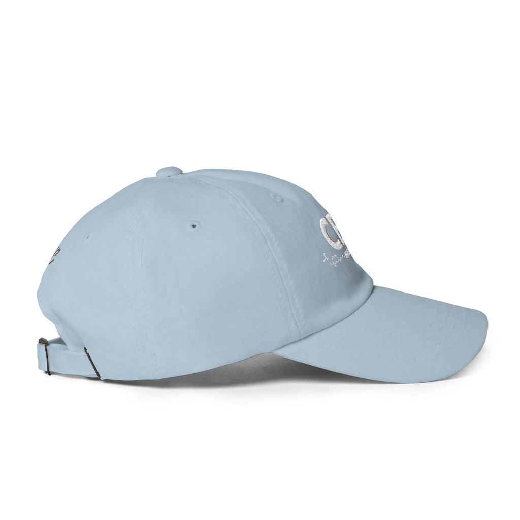 Right-side view of the light blue CBC Makes Me Happy dad hat showing its curved visor and relaxed six-panel construction.