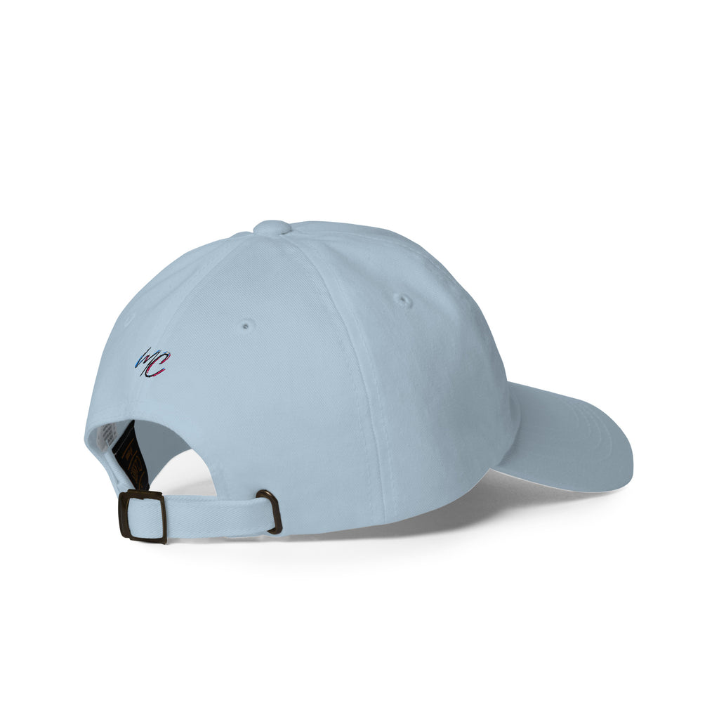 Rear three-quarter view of the light blue dad hat showing its adjustable opening and matching strap.