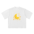 Front product view of the white oversized tee featuring a glowing gold citrus moon, botanical details and limonene molecule.