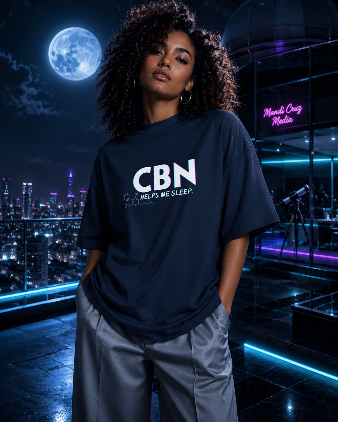 Woman modeling the French Navy CBN Helps Me Sleep oversized tee in a moonlit rooftop observatory.