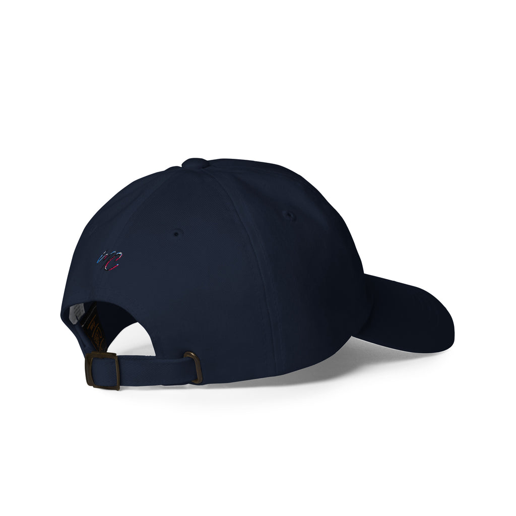 Rear three-quarter view of the navy dad hat showing its adjustable buckle and small MCM embroidery.