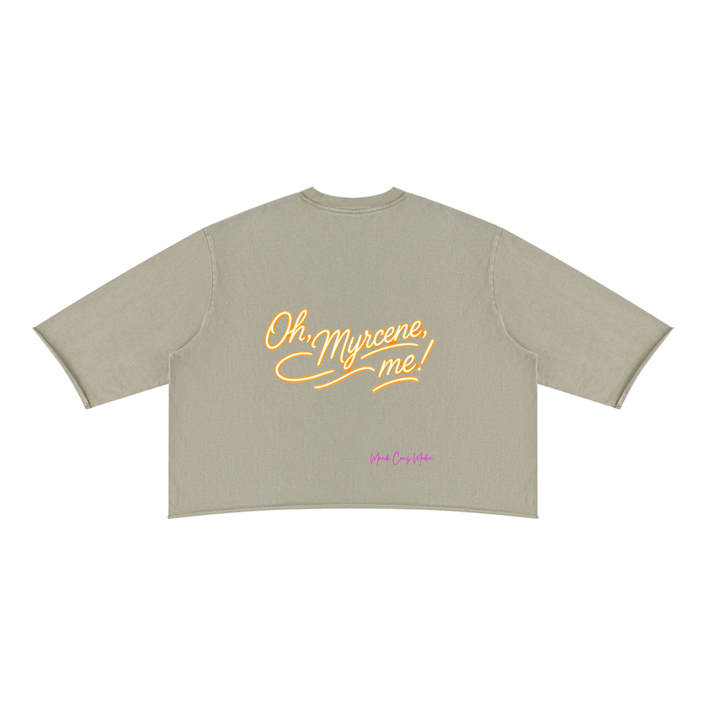 Back product view of the apricot mineral-wash boxy tee featuring gold Oh, Myrcene, Me! script and pink Mandi Cruz Media branding.