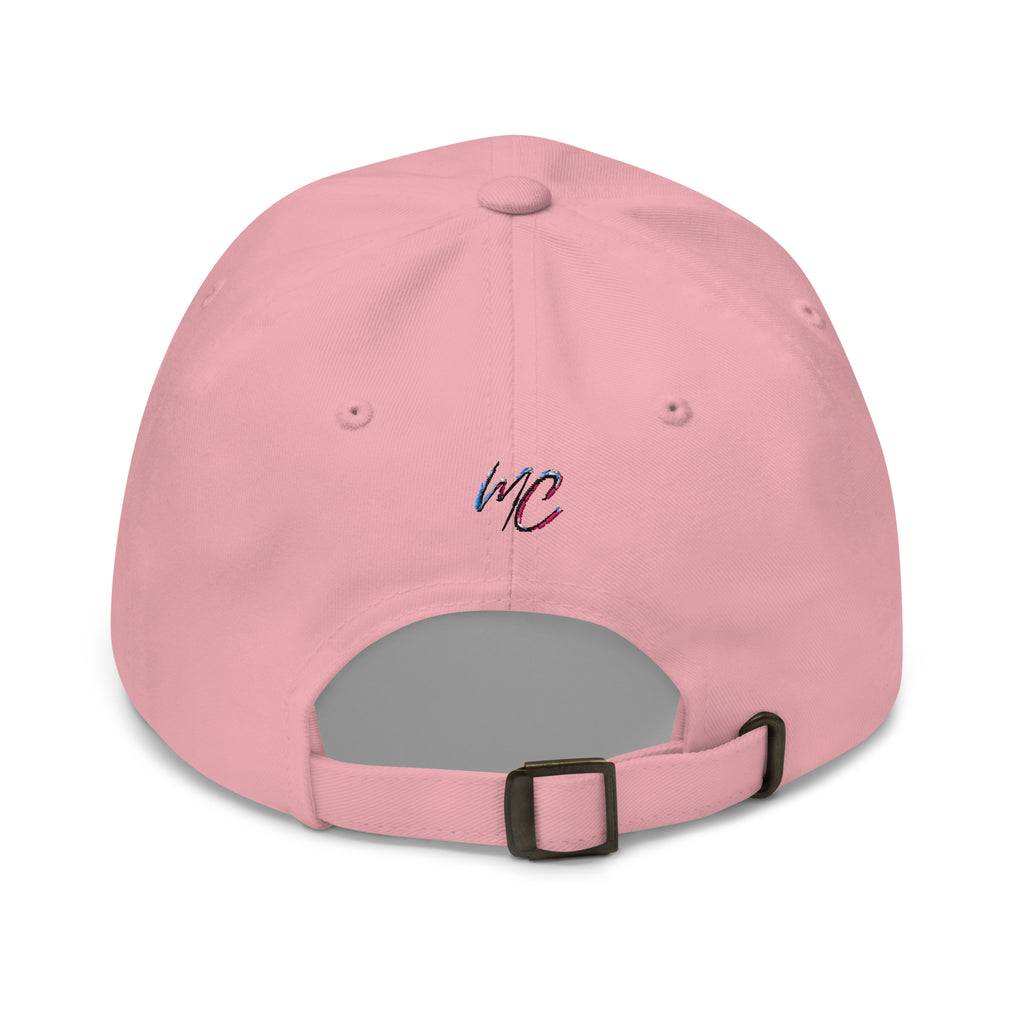 Back view of the pink dad hat showing the small MCM embroidery and matching adjustable strap.