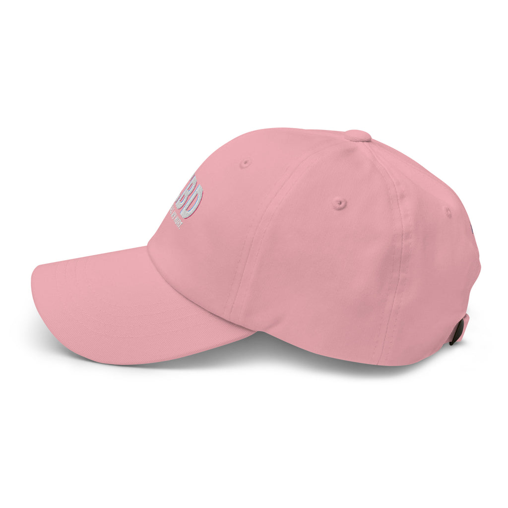 Left-facing side profile of the pink CBD Heals My Hurt dad hat showing its curved brim and adjustable back.