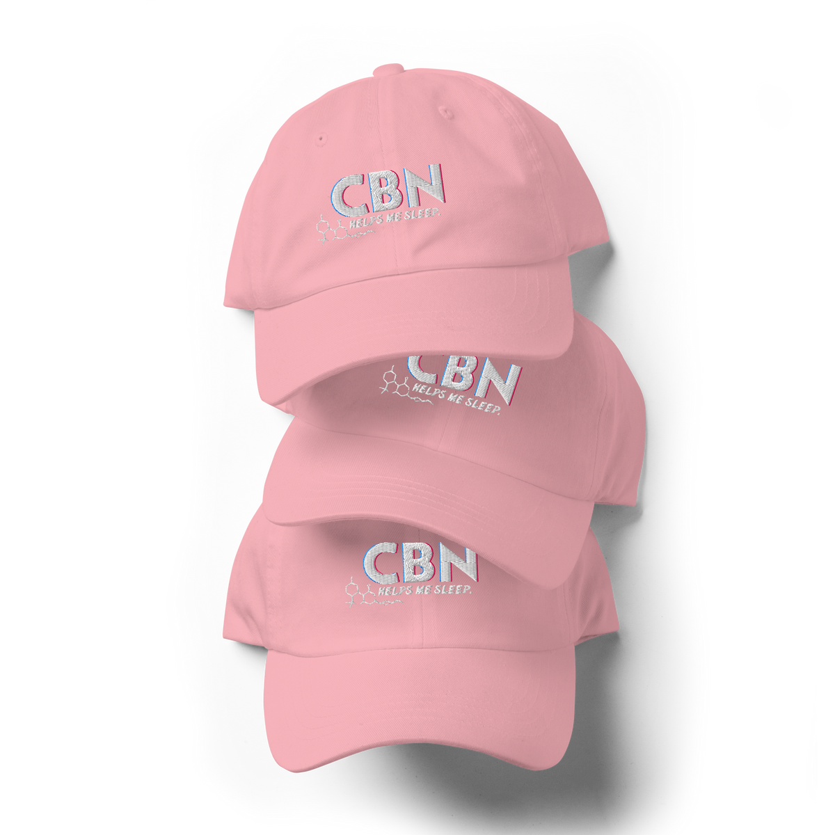 Front product view of the pink CBN Helps Me Sleep dad hat with embroidered cannabinoid-inspired artwork.
