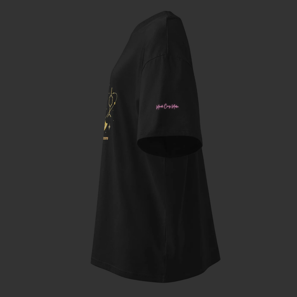 Left-side product view of the black Powered by Limonene oversized organic tee showing the pink Mandi Cruz Media sleeve signature.