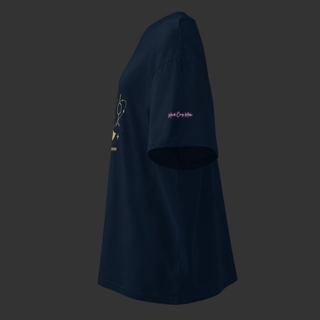Left-side product view of the French-navy oversized organic tee showing the pink Mandi Cruz Media sleeve signature.