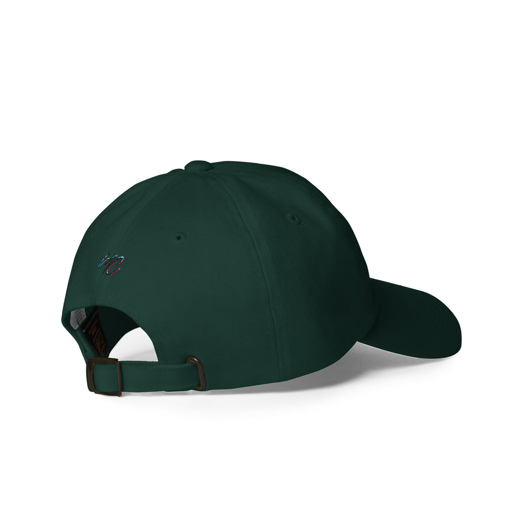 Right-rear view of the spruce green CBC Makes Me Happy dad hat showing its small MCM embroidery, adjustable strap and antique buckle.