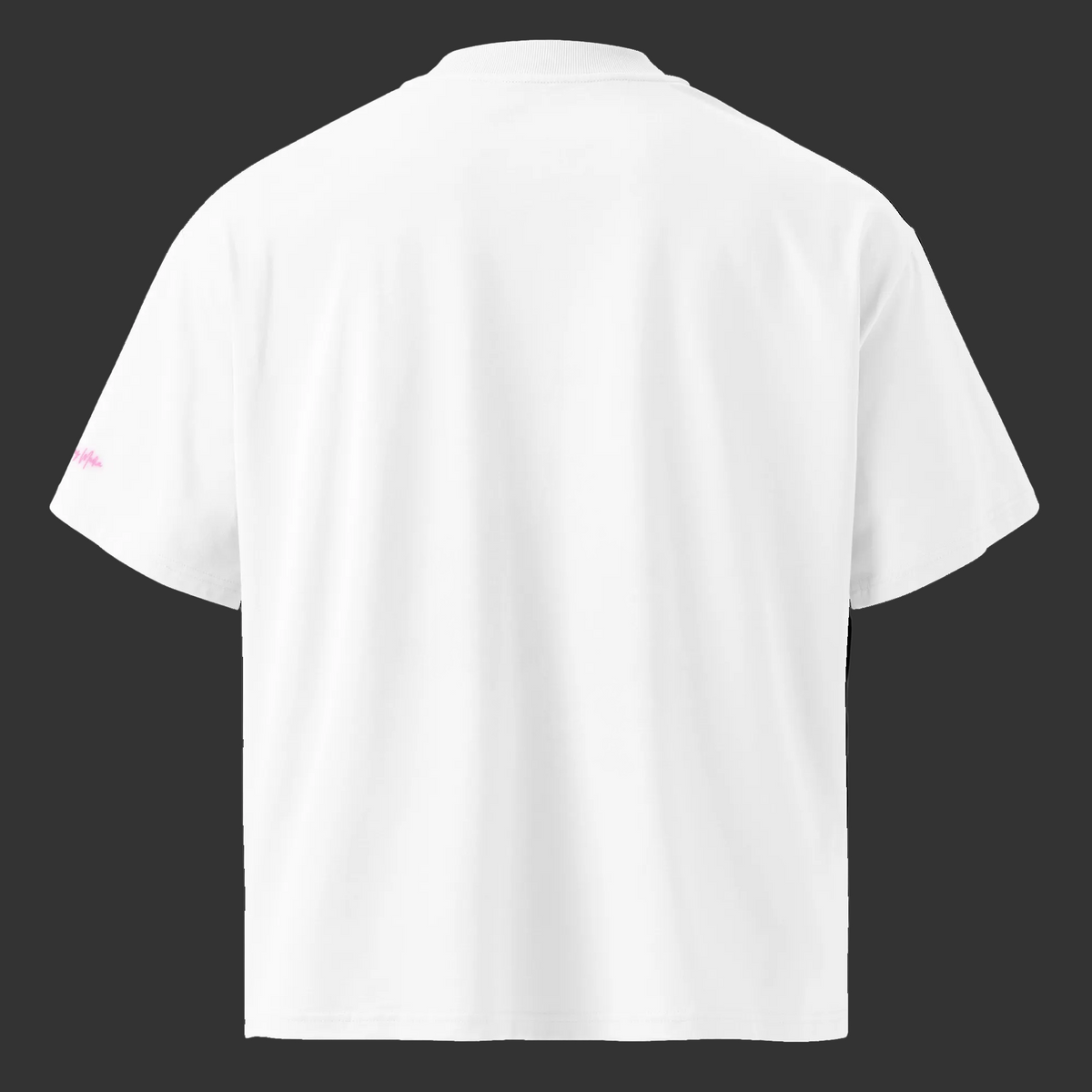Back view of the white oversized organic tee with a plain back and pink Mandi Cruz Media sleeve signature.
