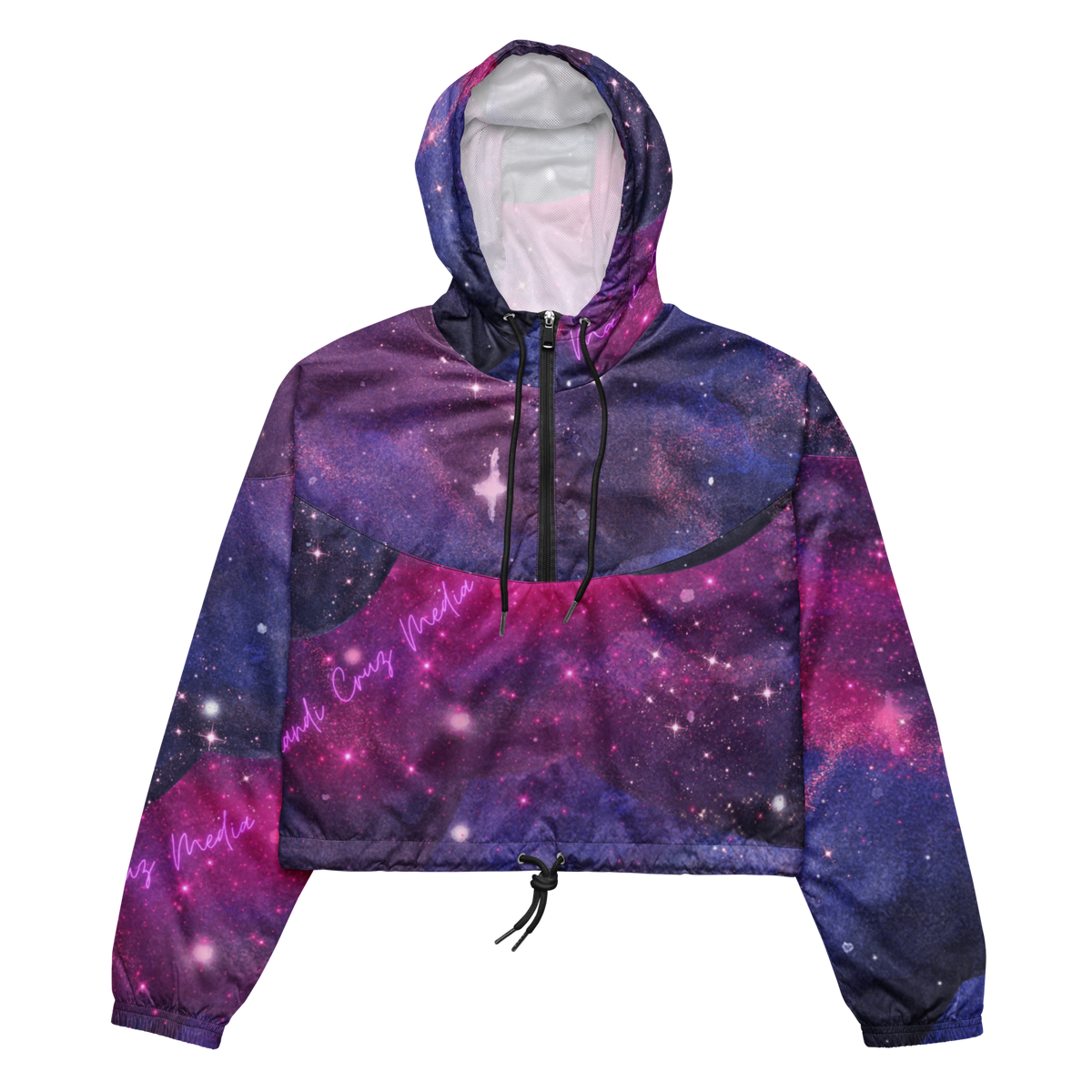 Front product view of the women’s cropped windbreaker featuring a pink, purple and indigo galaxy print with Mandi Cruz Media script.