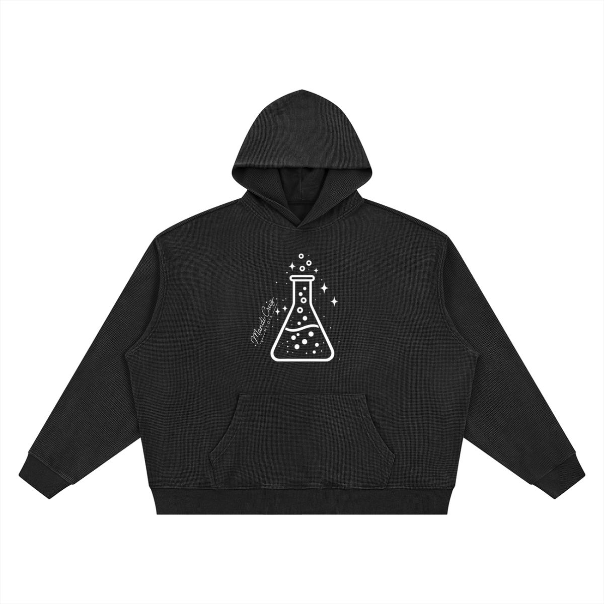 Front view of black Beaker™ Vintage Wash Waffle Boxy Hoodie by Mandi Cruz Media with oversized unisex fit and kangaroo pocket.