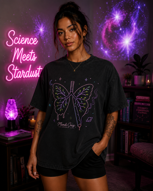 Lifestyle front view of a model wearing the Mandi Cruz Media Butterfly Lungs™ heavyweight vintage washed T-shirt with oversized streetwear fit.