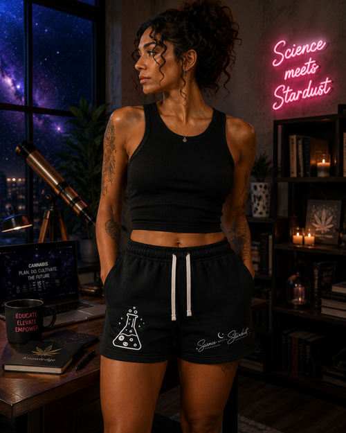 Lifestyle front view of black Mandi Cruz Media Beaker™ fleece sweatshorts with relaxed fit, drawstring waistband, and side pockets.
