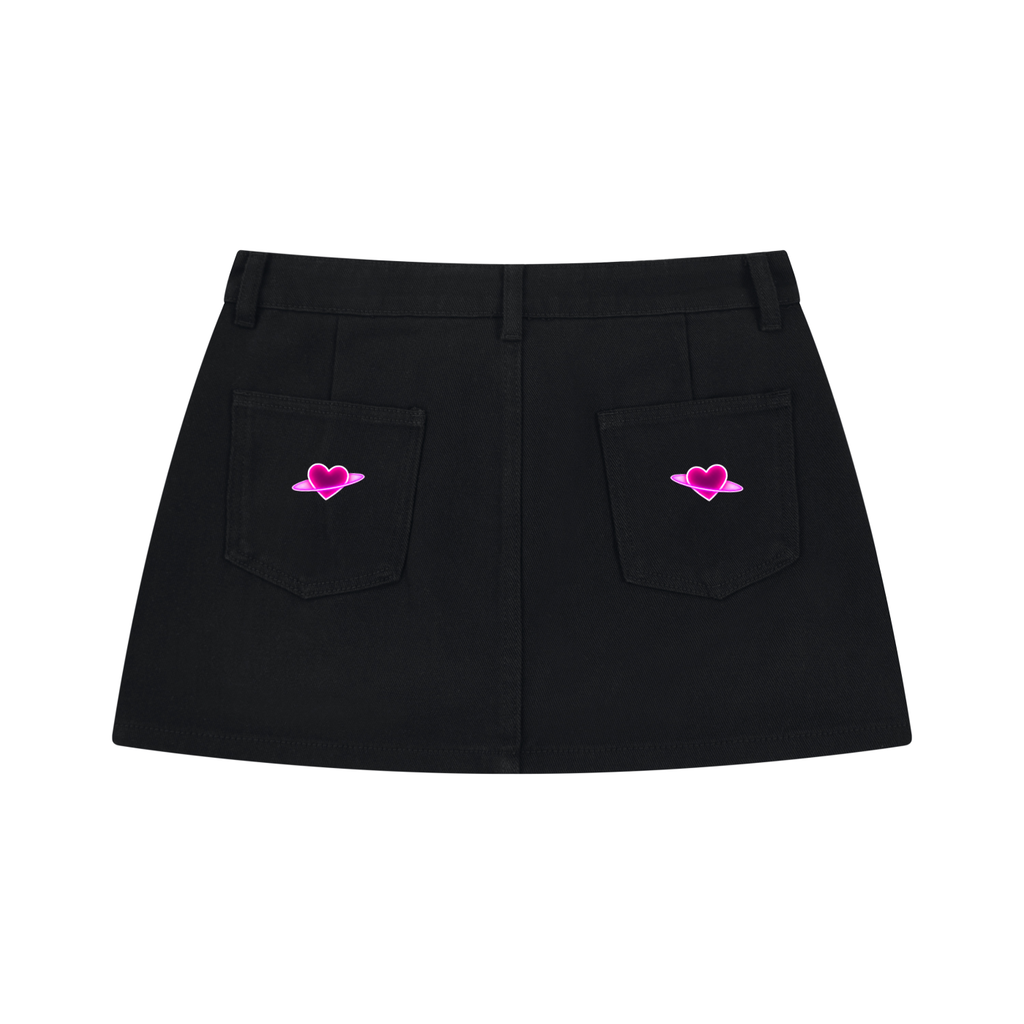 Back product view of the Electric Stardust black denim mini skirt featuring two back pockets with pink embroidered heart details.