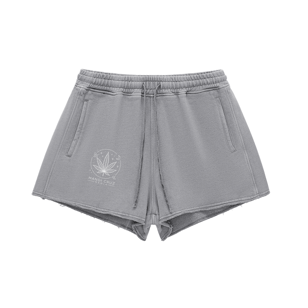Science Meets Stardust™ gray snow-washed lounge shorts by Mandi Cruz Media with cosmic leaf front graphic and raw-edge hem
