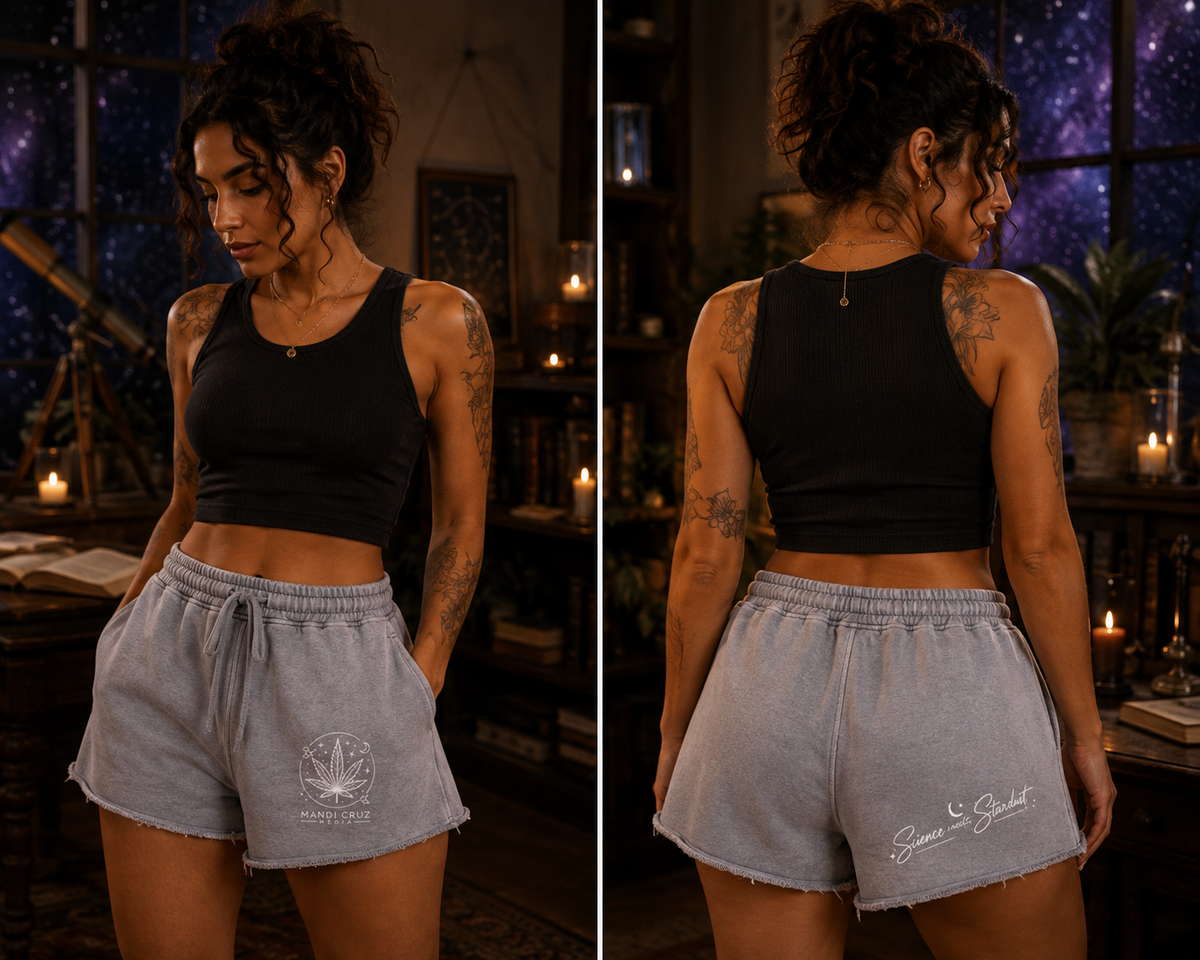 Front lifestyle view of gray Mandi Cruz Media snow-washed raw-edge lounge shorts with relaxed oversized fit