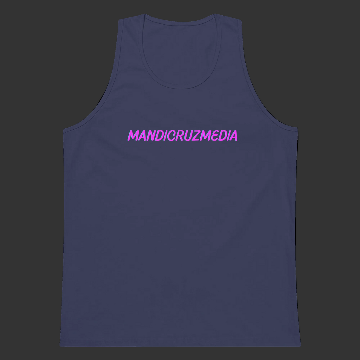 Front product view of the muted Harbor Blue Mandi Cruz Media men’s premium tank with a hot-pink signature logo.