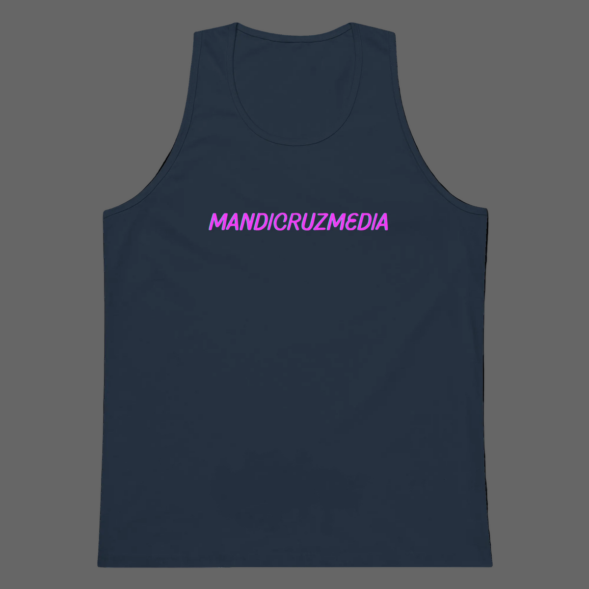 Front product view of the navy Mandi Cruz Media men’s premium tank with a hot-pink signature logo and relaxed longline fit.