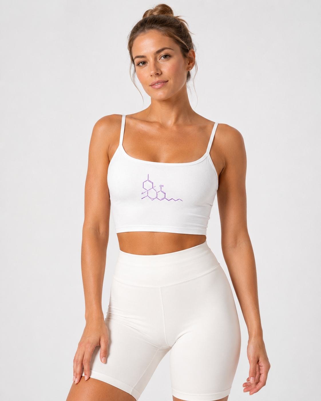 Lifestyle view of the Neon THC Molecule Crop Tank showing the fitted cropped silhouette and THC molecular artwork on the front.