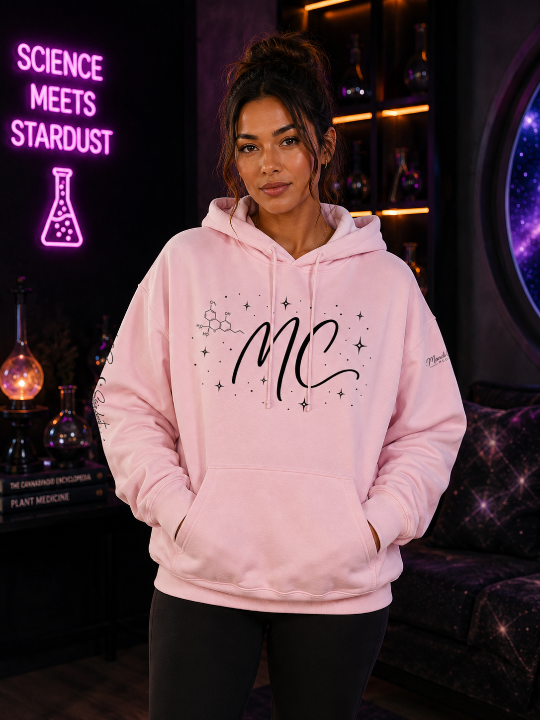Lifestyle front view of a model wearing the Mandi Cruz Media Science Meets Stardust™ heavyweight hoodie with relaxed oversized streetwear fit.
