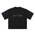 Front view of black Science Meets Stardust™ oversized drop shoulder T-shirt by Mandi Cruz Media with premium heavyweight unisex fit.