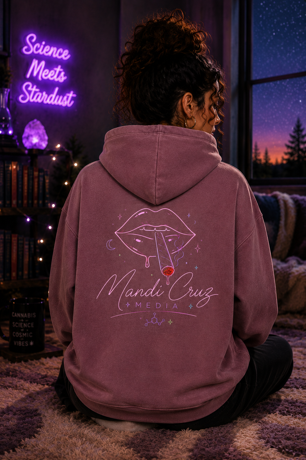 Back lifestyle view of a model wearing the Mandi Cruz Media Smoker’s Lips™ snow wash oversized hoodie highlighting the back artwork.